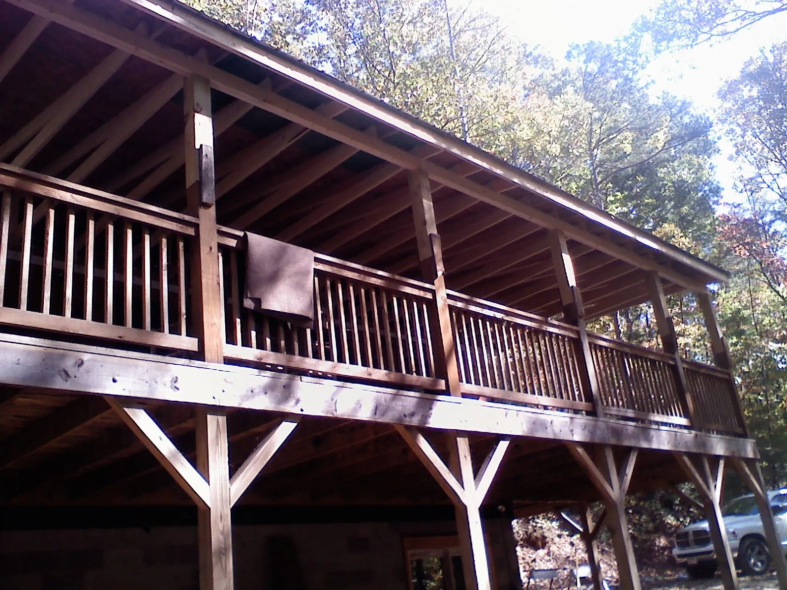 Timber framing under a new elevated porch and deck — Roof Leak Repair in Willmar by Roofing Brothers